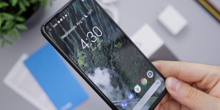 person holding black android smartphone