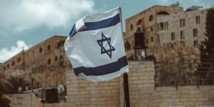 blue and white flag on pole